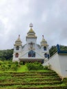 Traditional architectural design church building surrounded by trees and landscapes located in Rajapuram Kasaragod Kerala