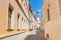 building St. Michael tower and narrow street at foreground in Bratislava, Slovakia