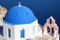 Traditional architecture church in Oia village, landmark of Greek Islands, Aegean Sea.