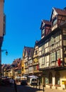 Colmar street view with medieval timber-framed townhouses in summer