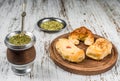 Traditional Argentinian yerba mate tea in calabash gourd and argentine pastries. Royalty Free Stock Photo