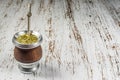 Traditional Argentinian yerba mate tea in a calabash gourd with bombilla stick. Royalty Free Stock Photo