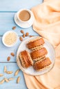 Traditional armenian dessert gata with cup of coffee on a blue wooden background. top view, close up Royalty Free Stock Photo