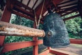 Traditional asian big ceremony bronze bell in temple. Royalty Free Stock Photo