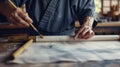 Traditional Asian calligrapher creating beautiful art