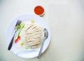 Traditional Asian Chinese Street Food: Khao Man Kai Kao Man Gai is Hainanese chicken rice, steamed chicken meat and white rice.