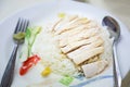 Traditional Asian Chinese Street Food: Khao Man Kai Kao Man Gai is Hainanese chicken rice, steamed chicken meat and white rice.