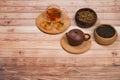 Traditional asian clay teapot with tea set and wooden bowls Royalty Free Stock Photo