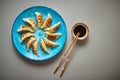 Traditional asian dumplings Gyozas on turqoise ceramic plate Royalty Free Stock Photo