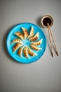 Traditional asian dumplings Gyozas on turqoise ceramic plate Royalty Free Stock Photo