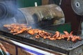 Traditional asian food at market. Delicious spicy grilled chicken meat on sticks