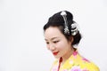 Traditional Asian Japanese woman with kimono on isolated white background