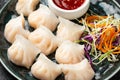 Traditional Asian Prawn or shrimp dumplings hakau, ha kauw or har gow. Served with cabbage, carrot salad and soy and Royalty Free Stock Photo