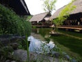 Traditional Asian wooden house on the lake. The floating village on the water