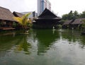 Traditional Asian wooden house on the lake. The floating village on the water