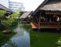 Traditional Asian wooden house on the lake. The floating village on the water