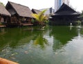 Traditional Asian wooden house on the lake. The floating village on the water