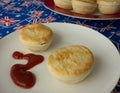 Traditional Australian Meat Pies And Tomato Sauce. Royalty Free Stock Photo