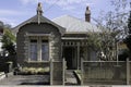 Traditional Australian wooden colonial residential house with wrought iron porch posts and railings Royalty Free Stock Photo