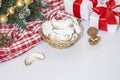 Traditional Austrian and German crescent-shaped Christmas pastries - Vanillekipferl - on a white table with Christmas decorations Royalty Free Stock Photo