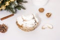 Traditional Austrian and German crescent-shaped Christmas pastries - Vanillekipferl - on a white table with Christmas decorations Royalty Free Stock Photo