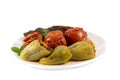 Traditional Azerbaijan food Dolma. Uc baci, Pomidor badimcan biber dolmasi. Tomatoes, eggplants and peppers filled with meat Royalty Free Stock Photo