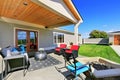 Traditional back porch with decking and a roof extension. Royalty Free Stock Photo