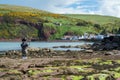 Traditional bagpiper in full dress code near Pennan Royalty Free Stock Photo