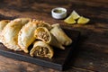 Traditional baked Argentine empanadas savoury pastries with beef stuffing.