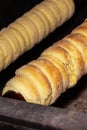 Traditional baking Slovakia Czech Republic Latvia trdelnik spiral cone over open fire toasted, tradition Christmas fair