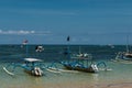 Traditional balinese dragonfly boat on the beach. Jukung fishing boats on Sanur beach, Bali, Indonesia, Asia Royalty Free Stock Photo