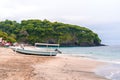 Traditional Balinese fisherman boats on a Virgin beach or Pasir Putih or Perasi Beach on Bali, Indonesia. Beautiful and clean