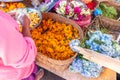 Traditional balinese handmade offering to gods on a morning market in Ubud. Bali island. Royalty Free Stock Photo