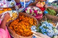 Traditional balinese handmade offering to gods on a morning market in Ubud. Bali island. Royalty Free Stock Photo