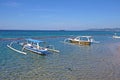 Traditional balinese jukung fishing boats on Sanur beach, Bali, Indonesia Royalty Free Stock Photo