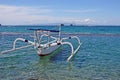 Traditional balinese jukung fishing boats on Sanur beach, Bali, Indonesia