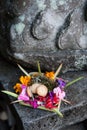 Traditional balinese offering to gods with flowers