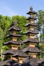 Traditional balinese roofs in hindu temple of Bali Island, Indonesia. Travel and architecture background. Royalty Free Stock Photo