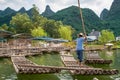 Traditional bamboo raft on Yulong River, Yangshuo, Guangxi, China