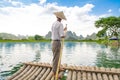 Traditional bamboo raft on Yulong River, Yangshuo, Guangxi, Chin Royalty Free Stock Photo