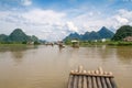 Traditional bamboo raft on Yulong River, Yangshuo, Guangxi, ChinTraditional bamboo raft on Yulong River, Yangshuo, Guangxi, China. Royalty Free Stock Photo