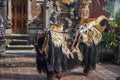 Traditional Barong dance with mask and colourful dress to mimic hindu character from Ramayana during the morning in Bali