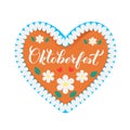 Traditional Bavarian heart-shaped gingerbread decorated with flowers, leaves and lettering Oktoberfest. Easy to edit vector Royalty Free Stock Photo