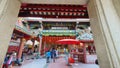 Traditional beautiful Chinese architecture and detail with people walking around Tai Hong Kong Shrine the famous Chinese for Thai Royalty Free Stock Photo