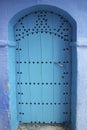 Traditional beautiful door in blue city of Chefchaouen, Morocco. Typical moroccan architecture. Royalty Free Stock Photo