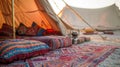 A traditional Bedouin tent adorned with colorful textiles and carpets provides a cozy and culturally immersive sleeping Royalty Free Stock Photo