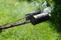 Traditional beekeeping. Smoke device for aggressive bees Royalty Free Stock Photo