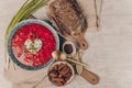 Tasty Ukrainian and Russian traditional beet soup borsh with sour cream in a bowl. Close-up and rustic style Royalty Free Stock Photo