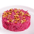 Traditional Beetroot salad with nuts on plate Royalty Free Stock Photo