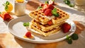 Traditional Belgian waffles with honey and strawberries serving